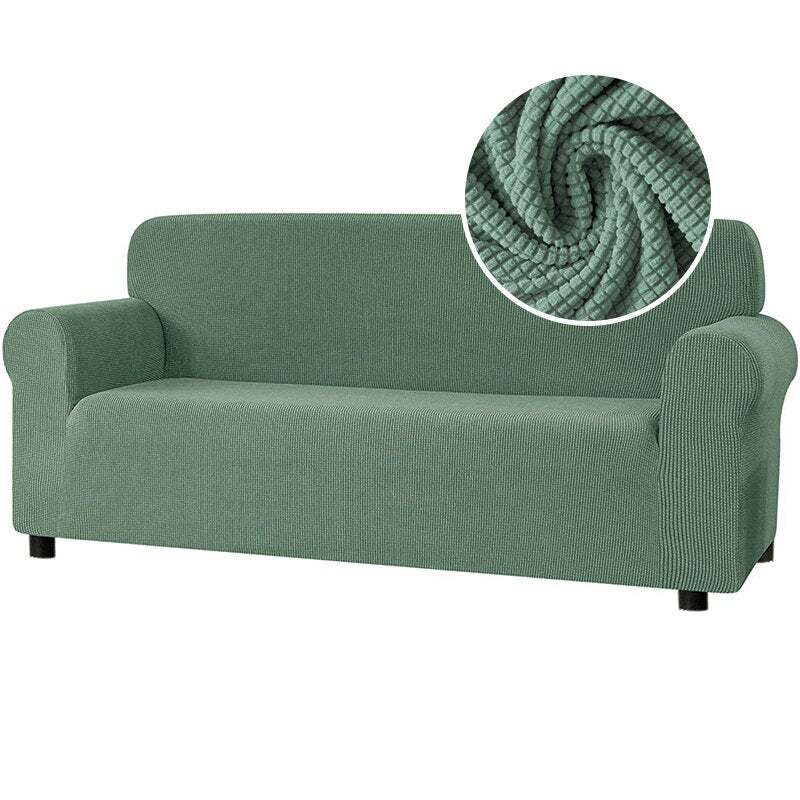 How to style a sage green sofa cover in a Bristol eco-home?
